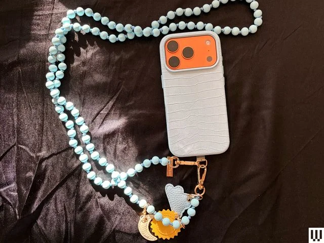 Image may contain Accessories Jewelry Necklace and Symbol