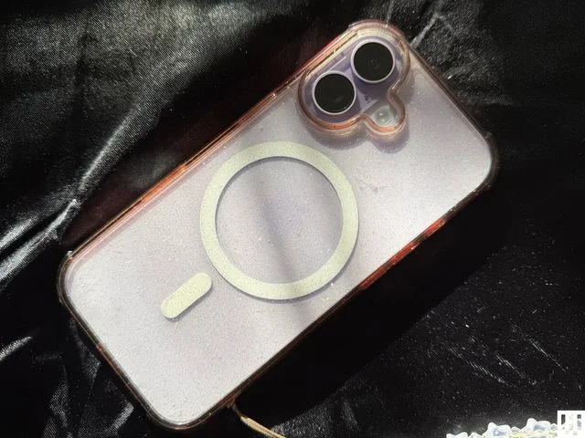 Image may contain Electronics Mobile Phone Phone Medication and Pill