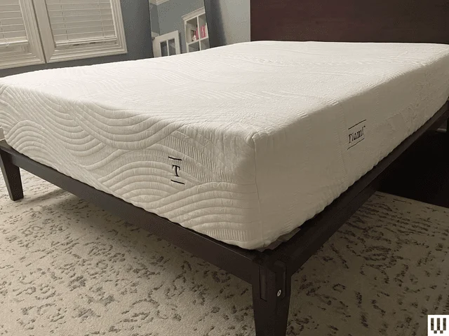 Image may contain Furniture Bed and Mattress