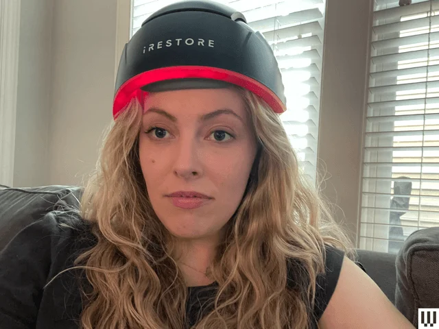 Image may contain: Clothing, Hardhat, Helmet, Cap, Hat, Adult, Person, Face, Head, Crash Helmet, Cosmetics, and Lipstick