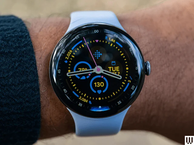 Image may contain Wristwatch Arm Body Part and Person