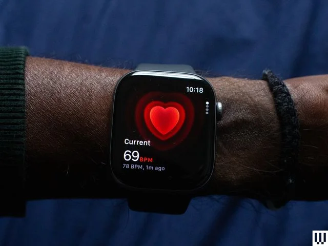 Image may contain Wristwatch Computer Hardware Electronics Hardware Monitor Screen Arm Body Part Person and Symbol