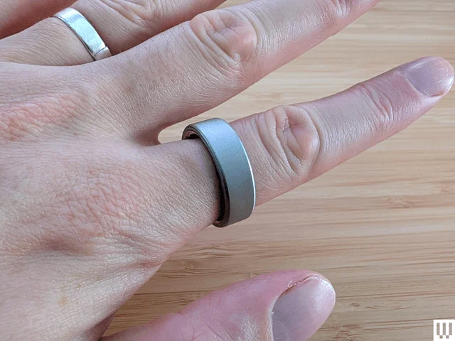 Image may contain Body Part Finger Hand Person Accessories Jewelry Ring Baby and Silver