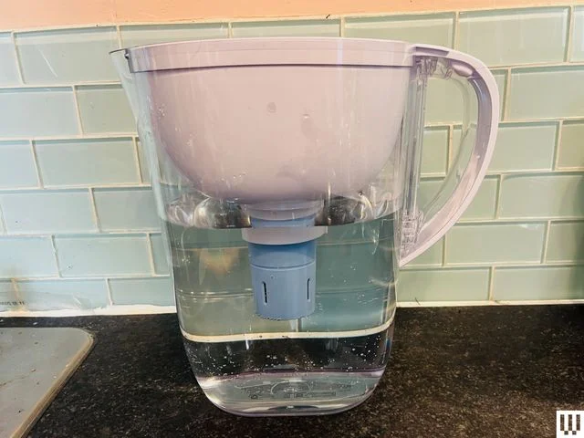 Image may contain: Jug, Appliance, Device, Electrical Device, Mixer, and Water Jug